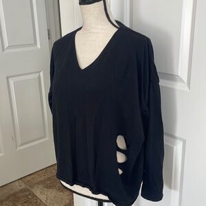 Planet Cropped distressed sweater.